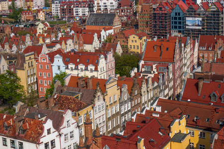 Gdansk, Poland Historical brick colorful building, red roofs and Baltic sea canal. Sunny day, spring time. Aerial view.の写真素材