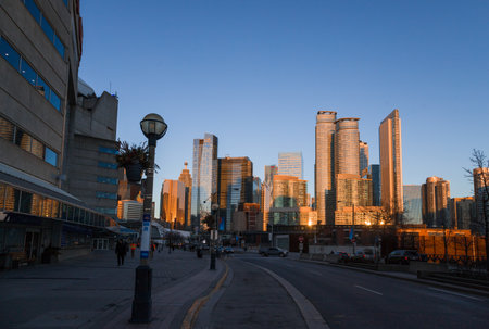 A magical evening in the financial district of downtown Toronto - evening clear sky, lights on...