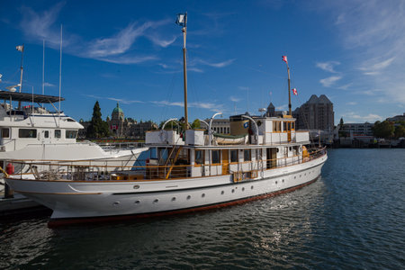 Victoria's harbor with old vessel to pier - transportation and entertainment. Pacific Coast Houses...
