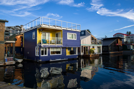 A famous tourist spot - Fisherman's Wharf, where there are colorful floating houses village, cafe and marina. Victoria, BC, Canadaの写真素材