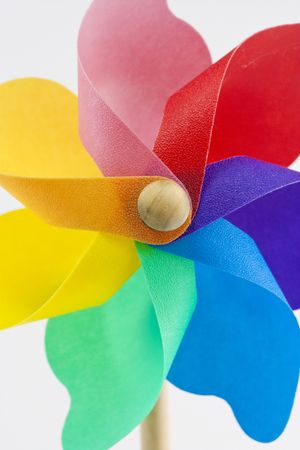 brightly coloured toy windmil close upの写真素材
