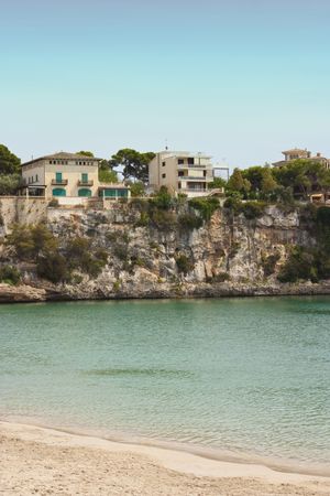 villas on the clifftop by porto cristo bayの写真素材