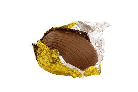 Easter egg unwrapped isolated on a white backgroundの写真素材