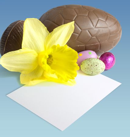 Easter still life with blank paper for messageの写真素材