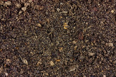 background of fine fertiliser type soil macro shotの写真素材