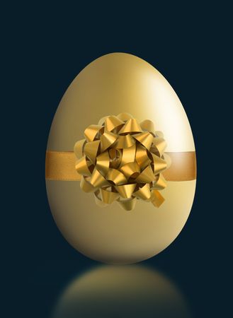gold easter eggs isolated on a black backgroundの写真素材