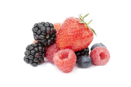 Geroup of summer berries, rasperries, blackberries and strawberries on whiteの写真素材