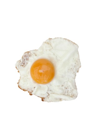 fried egg sunny side up on a white backgroundの写真素材