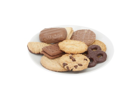 different types of biscuits on a plate on a white backgroundの写真素材