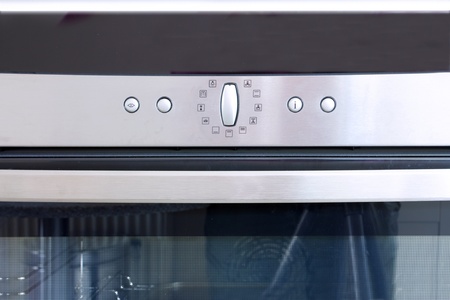 kitchen oven buttons for an electric digital built in ovenの写真素材