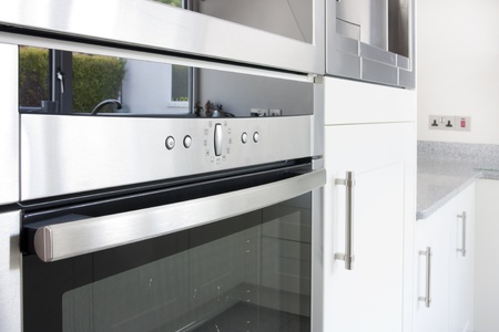 modern electric kitchen oven in a modern unitの写真素材