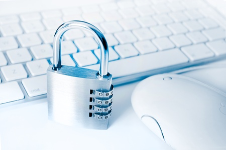 idea for computer and online security with keyboard and padlockの写真素材