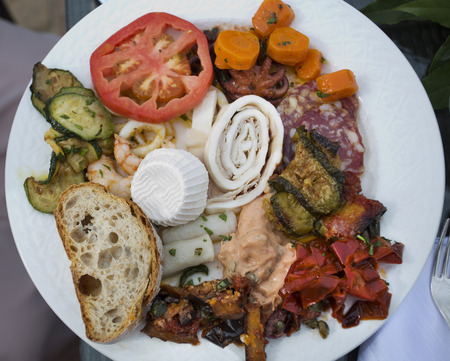Plate viewed from above including peperroni and vegetablesの写真素材