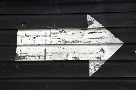 peeling paint on a grunge style wooden wallの写真素材