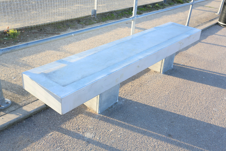 concrete cast cement seat or bench in a park area in harwich, ukの写真素材