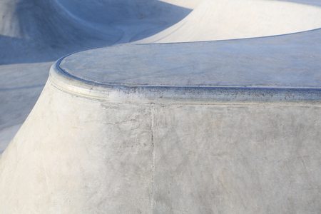 outdoor skatepark with blue sky and grey concrete in harwich, essex, ukの写真素材