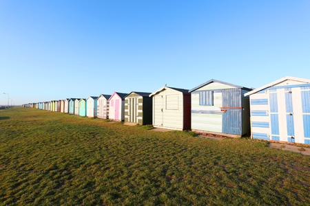 early morning sunrise showing beach huts at harwich, ukの写真素材