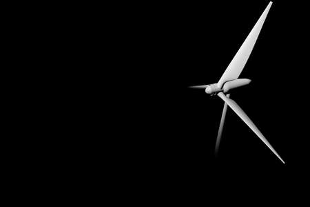 3d render concept of a wind turbine cut out on a black backgroundの写真素材