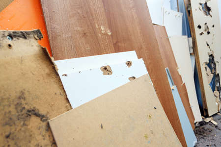 Old sheet of furniture and recycled timber and wood ready to be trashed or upcycledの写真素材