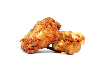 deep fried seasoned chicken that have been deep fried isolated on a white backgroundの写真素材