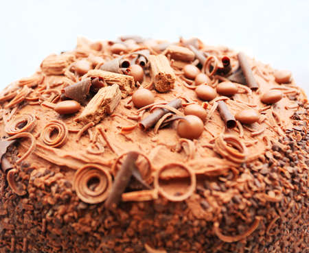 celebration and treat time with a big chocolate cake with choc swirlsの写真素材