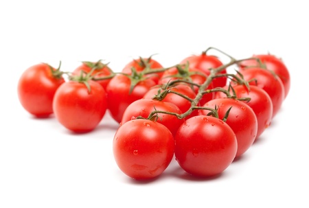Wet Cherry tomatoes on white の写真素材