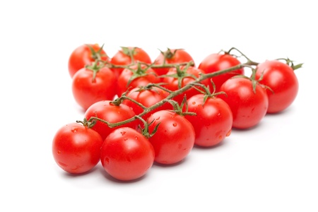 Wet Cherry tomatoes on whiteの写真素材