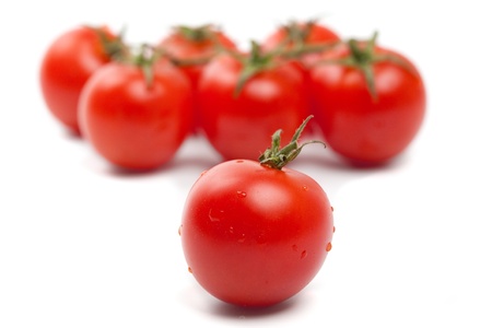 Wet Cherry tomatoes on whiteの写真素材