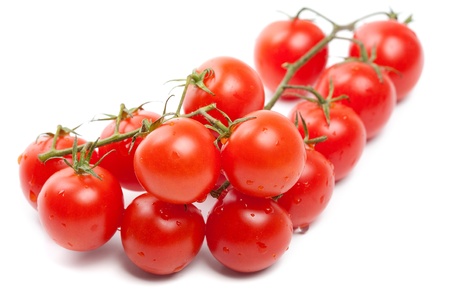 Wet Cherry tomatoes on whiteの写真素材