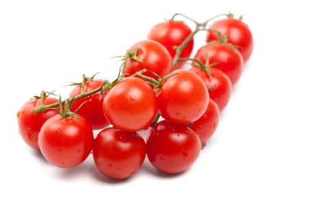 Wet Cherry tomatoes on whiteの写真素材