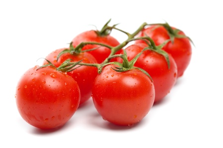 Wet Cherry tomatoes on whiteの写真素材