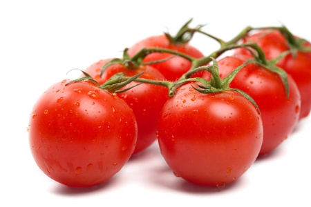 Wet Cherry tomatoes on whiteの写真素材