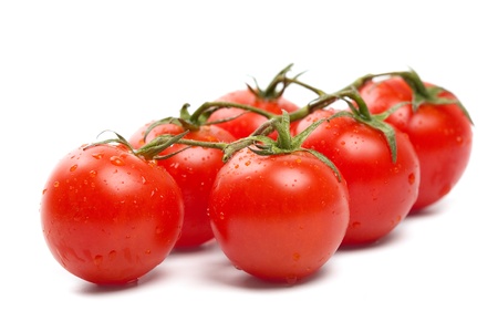Wet Cherry tomatoes on whiteの写真素材
