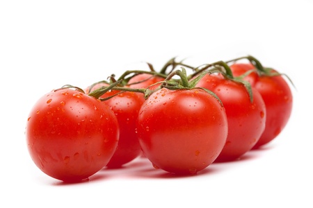 Wet Cherry tomatoes on whiteの写真素材