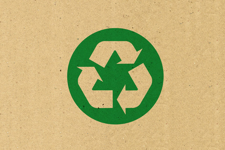 Recycle logo on brown paperの写真素材