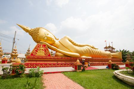Buddha statue at Wat Pha That Luang, Vientiane, Laosのeditorial素材