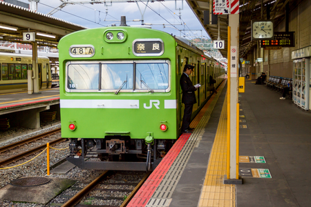 Kyoto, Japan - December 14, 2015 : Train waiting for passenger at the Kyoto station . JR West is the biggest railway companies in western . JAPAN 14 December 2015のeditorial素材
