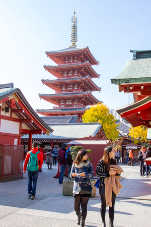 TOKYO, JAPAN - DECEMBER 7, 2015: Tourists walking around the most famous Sensoji buddhist temple in Asakusa,Tokyo Japanのeditorial素材