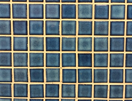 Blue glossy mosaic tile as the background texture
