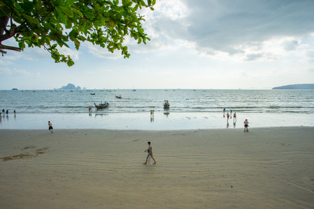 KRABI THAILAND - 2 FEB 2018: People relax and walking at Ao Nang beach before the sunset, Ao Nang beach is a famous tourist destination in Krabi, Thailandのeditorial素材