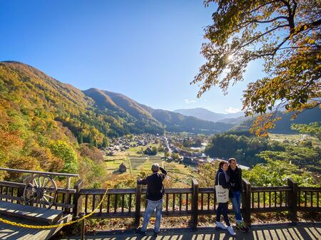 Shirakawa Japan - 12 Nov 2019: peopl look at View from the hill see the Shirakawago village in the autumn .It is a village with beautiful scenery reminiscent of the old days.のeditorial素材