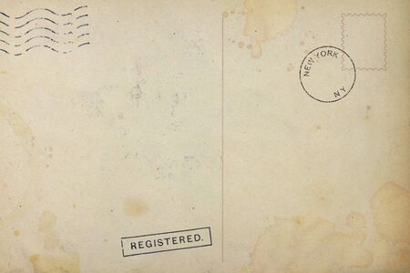 Backside of old postcard with dirty stain