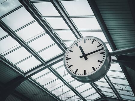 Public clock in railway station in Bangkok Thailandの写真素材