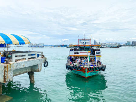 Pattaya Thailand - 11 July 2020: Many people in the ferry boat moving towards to the coast at Bali Hai Pierのeditorial素材