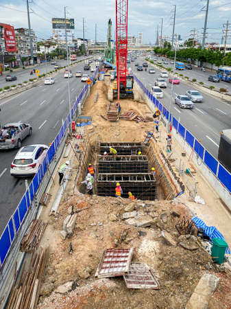 Bangkok Thailand - 22 Aug 2020: Construction workers are working at construction projects near the highway road at Rama II road in Bangkokのeditorial素材