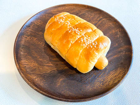 Sausage Bun on the wooden plate ready to eatの写真素材