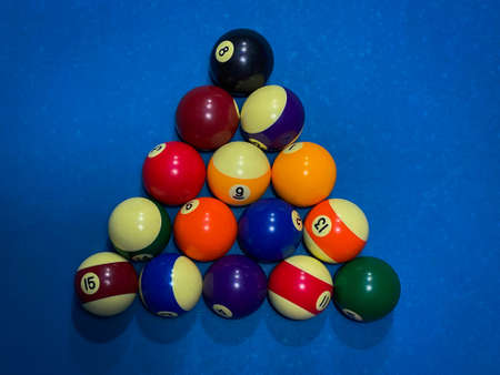 Top view close-up American billiards pool on a blue table