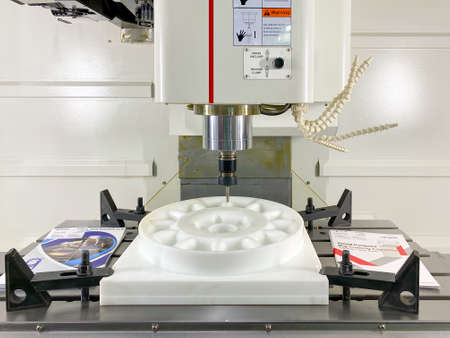 Bangkok Thailand - 20 Nov 2020: CNC milling machine working show it to customers in Metalex 2020 exhibition at Bitec Bangna exhibition hallのeditorial素材