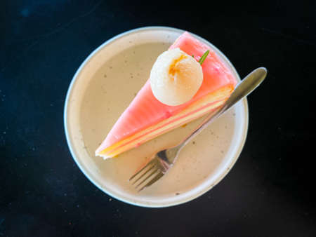 Beautiful cake with fruits placed on the tableの写真素材