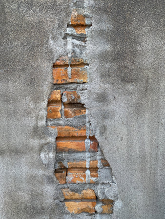 Crack brick wall as the background textureの写真素材